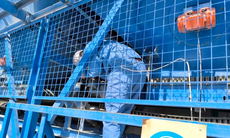 Maintenance of asphalt plant conveying system